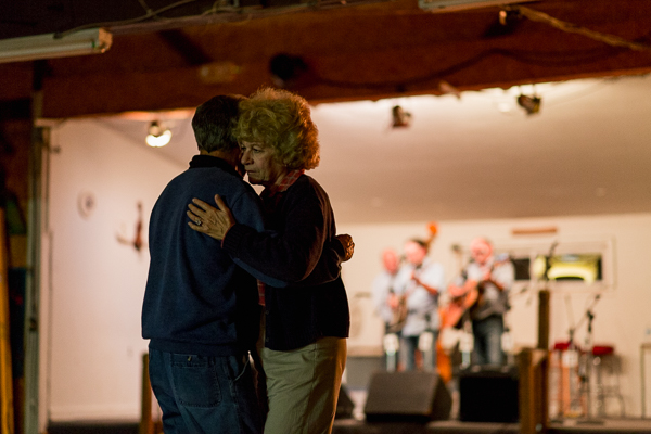 A couple dances to the music