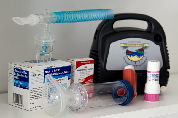 Assortment of medications and devices that have been used to treat Raye's asthma